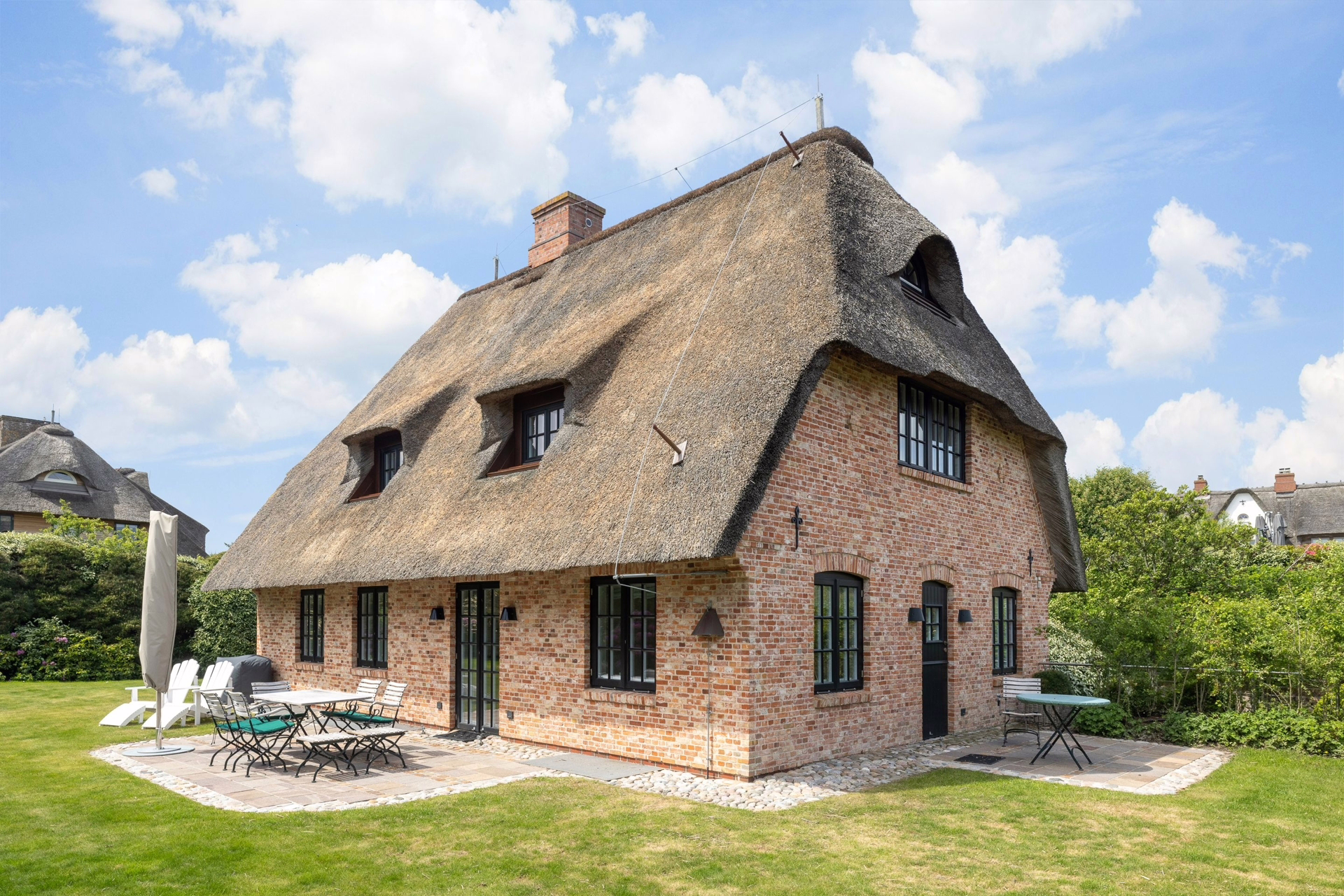 Bild - Charmantes Friesenhaus unter Reet mit einer Erdgarage am Keitumer Wattenmeer