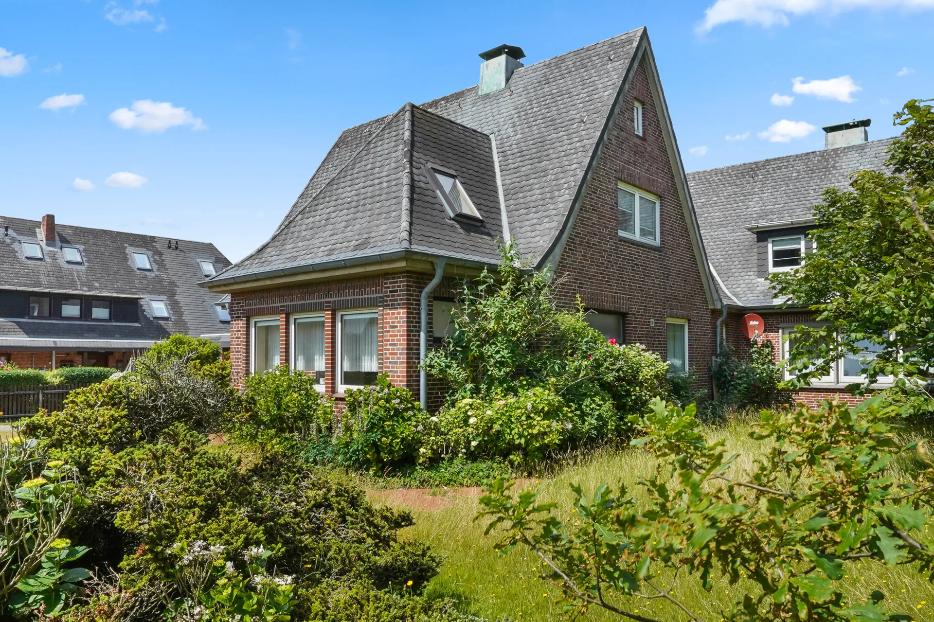 Bild - Doppelhaushälfte mit dem Charme eines Einzelhauses – inklusive Garage in strandnaher Lage