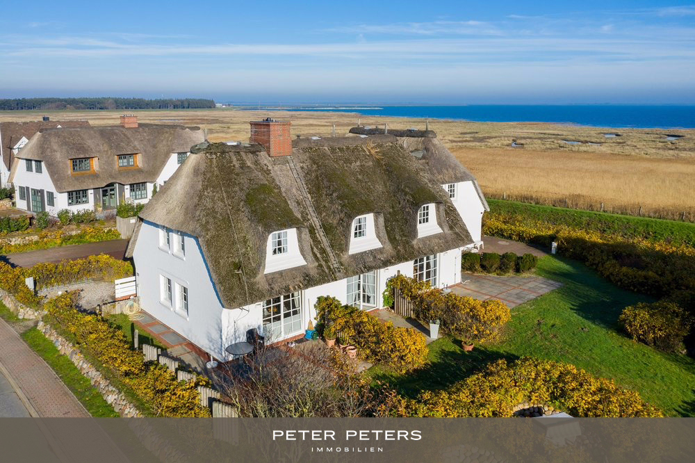 Schöne Erdgeschosswohnung unter Reet mit Blick über das Wattenmeer, 25980 Sylt, Erdgeschosswohnung