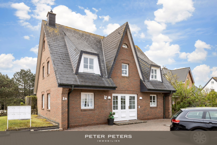 Titelbild - Gemütliche Erdgeschosswohnung mit Südgarten -Schwimmbad und Sauna im Haus-