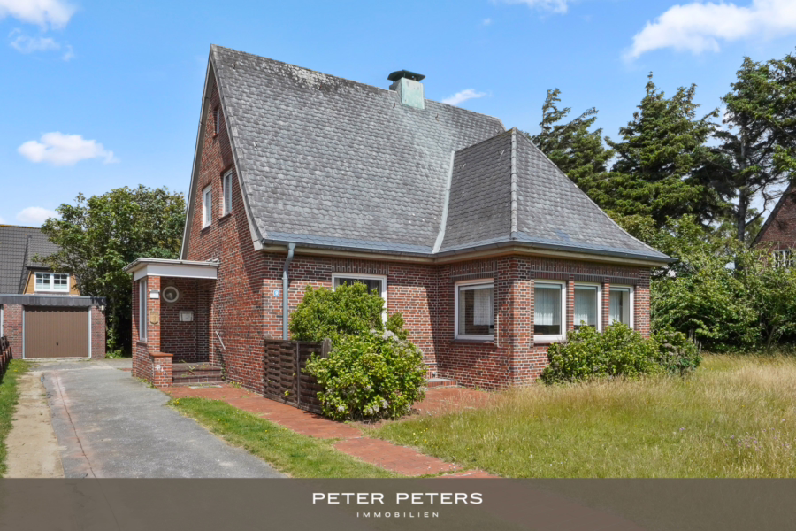 Titelbild - Doppelhaushälfte mit dem Charme eines Einzelhauses – inklusive Garage in strandnaher Lage