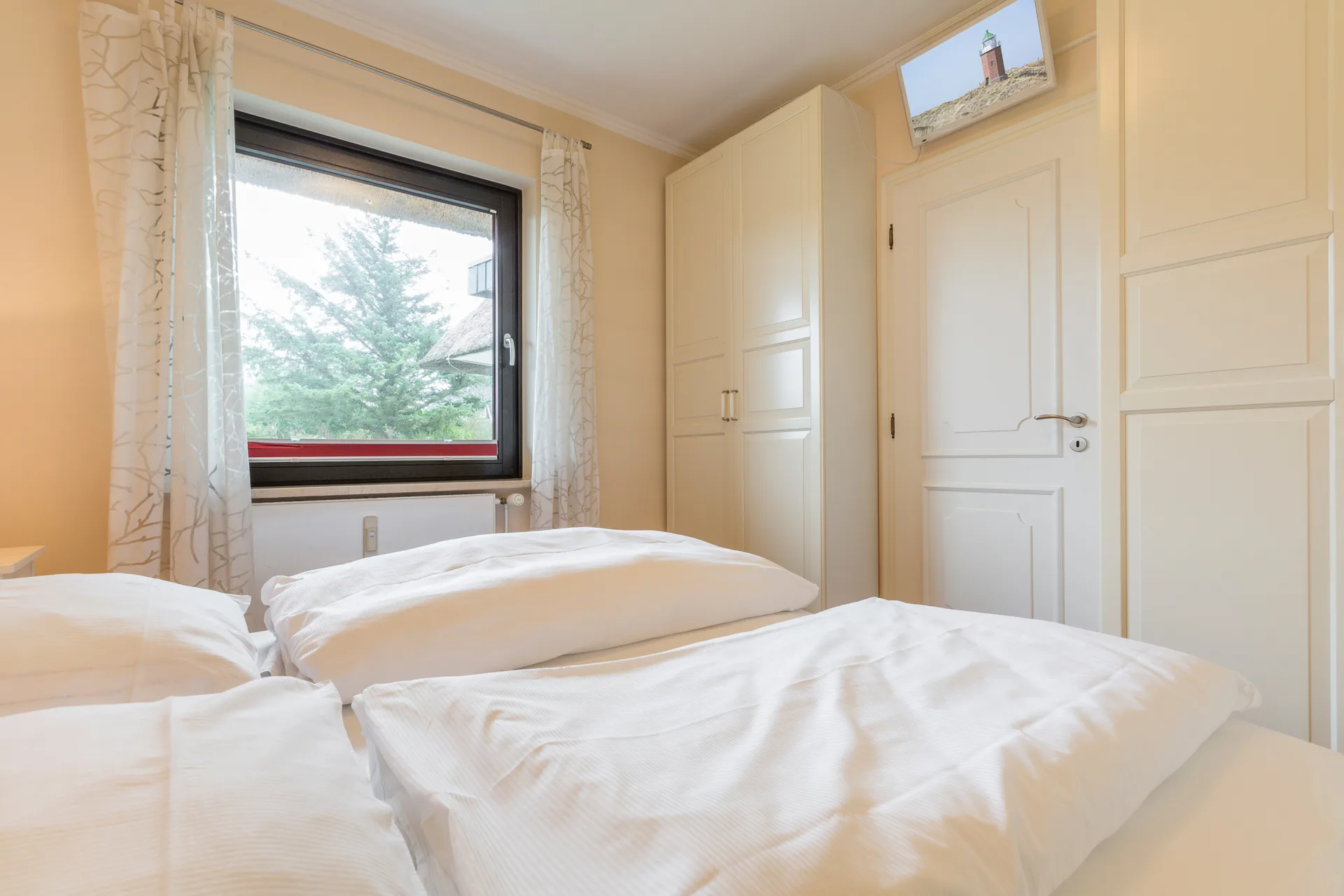 Bild - Schöne Erdgeschoss-Wohnung unter Reet mit Blick auf den Wenningstedter Dorfteich
