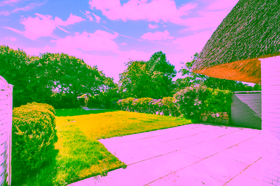 Bild - Liebevoll sanierte Haushälfte unter Reet in Keitum mit einer Garage