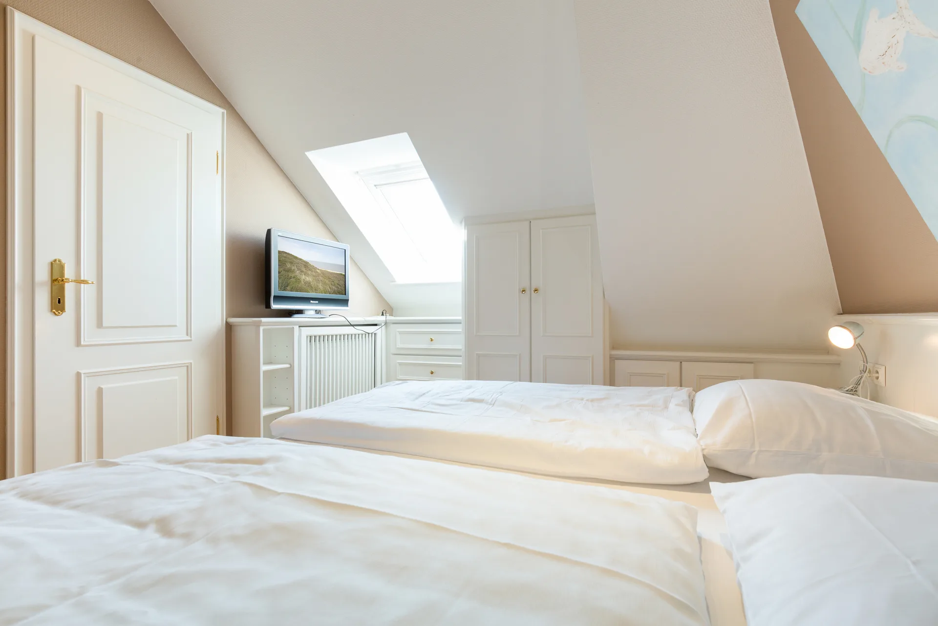 Bild - Charmante und helle Obergeschosswohnung mit Balkon in zentraler Lage von Wenningstedt