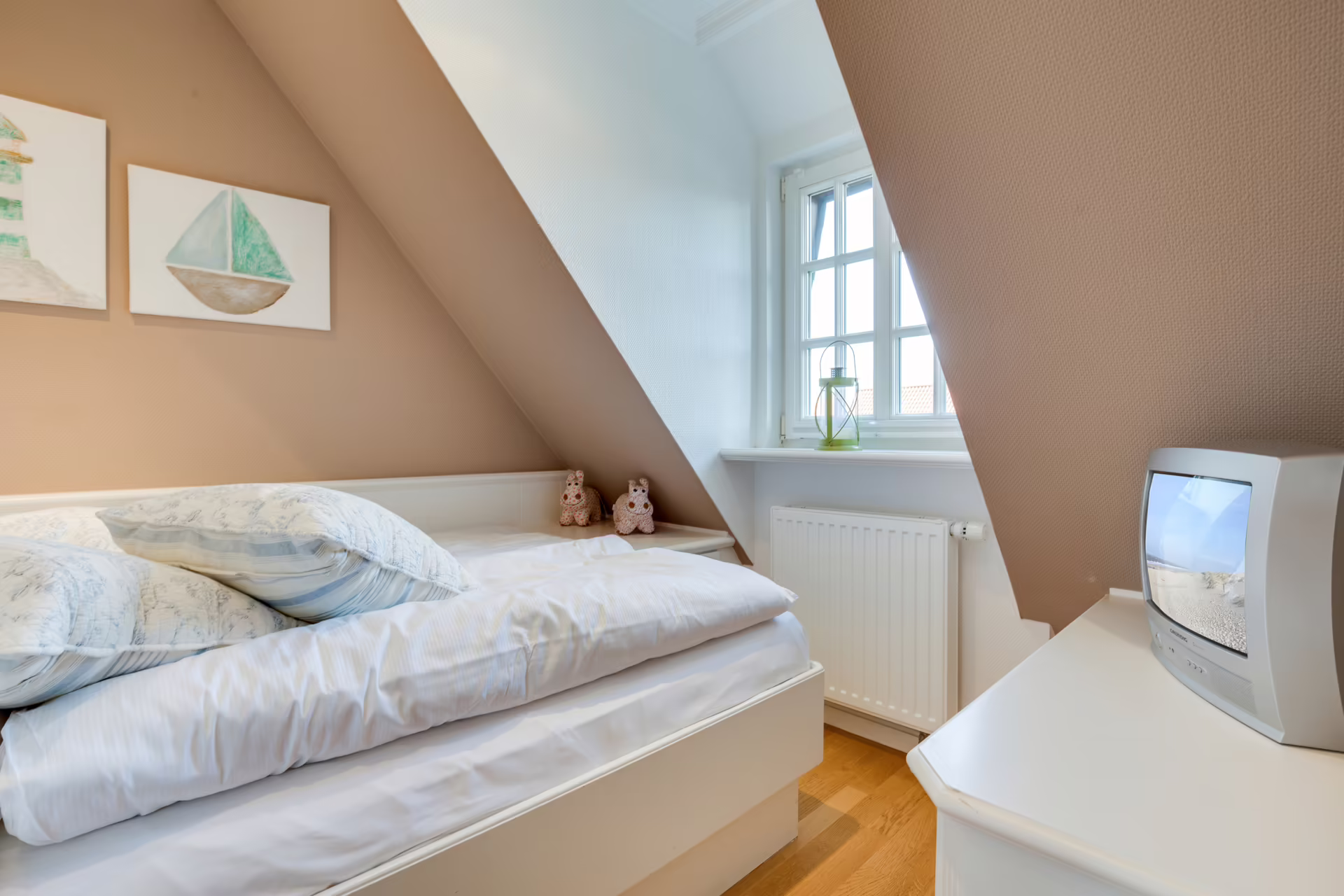 Bild - Charmante und helle Obergeschosswohnung mit Balkon in zentraler Lage von Wenningstedt