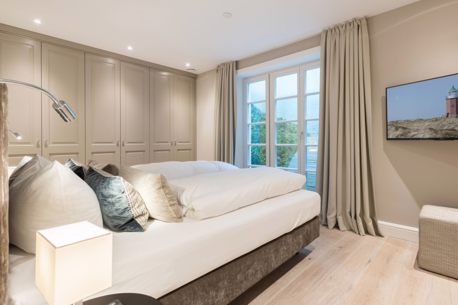 Bild - Exklusives Wohnen unter Reet direkt hinter den Dünen (DW)