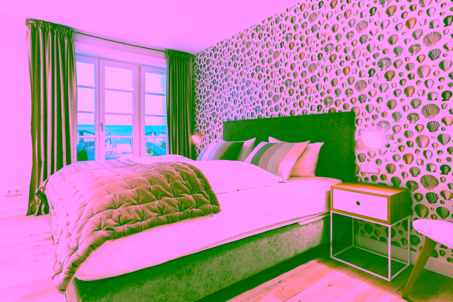 Bild - Exklusives Wohnen unter Reet direkt am Strand