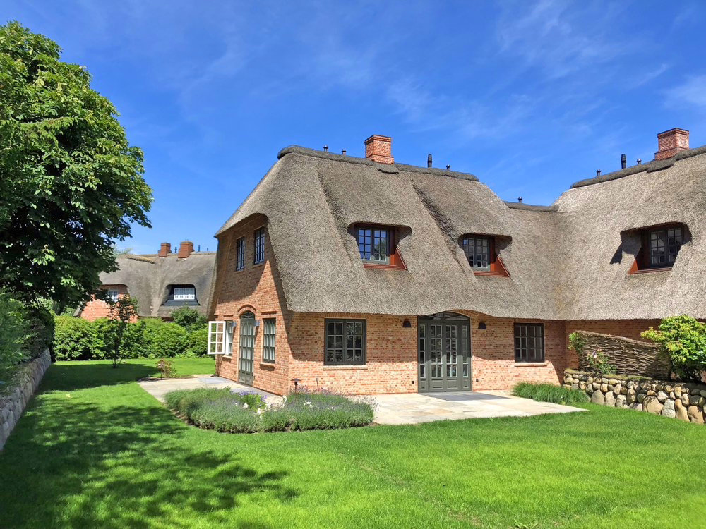 Haus 1 - Reetgedeckte, hochwertige Neubauhaushälften in Dorflage von Kampen