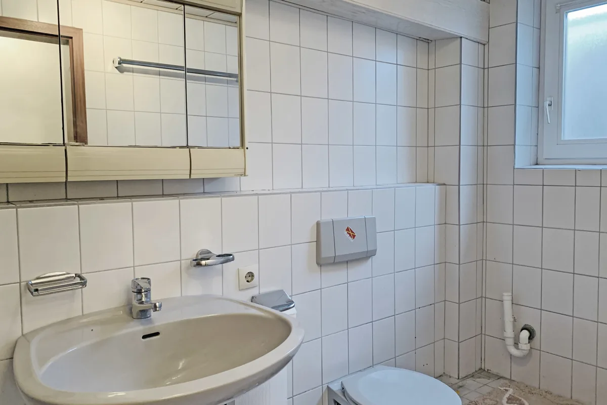 Bild - Mittelhausteil mit Westgarten an den Lister Dünen