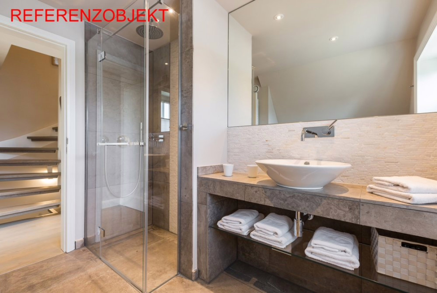 Referenzobjekt - Doppelhaushälften unter Reet in zentraler und wattnaher Lage von List