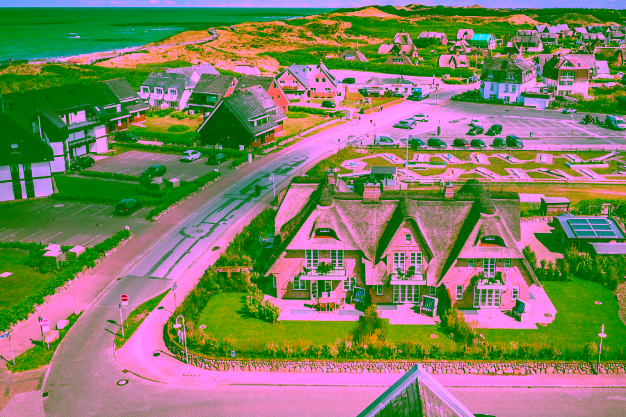 Titelbild - Exklusives Wohnen unter Reet direkt am Strand