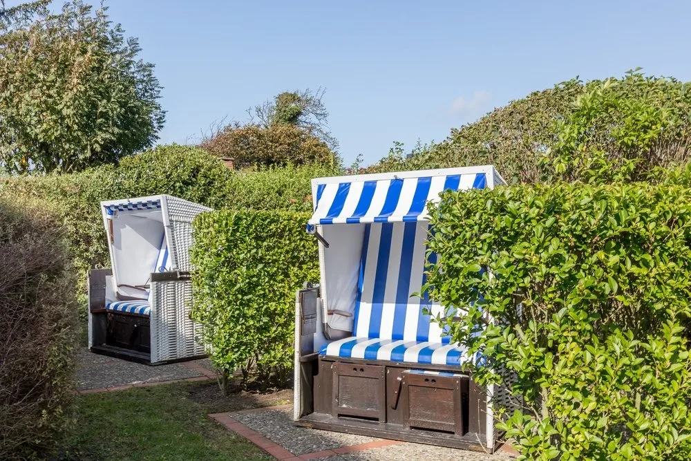 Bild - Helle Dachgeschosswohnungen unter Reet in strandnaher Lage von Westerland