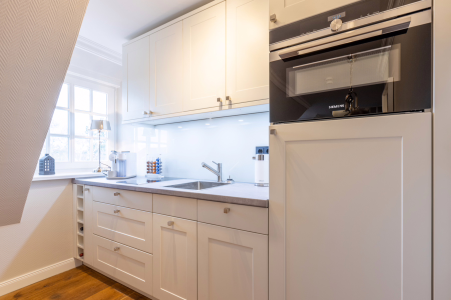 Bild - Schnuckelige Dachgeschosswohnung unter Reet in strandnaher Lage von Westerland