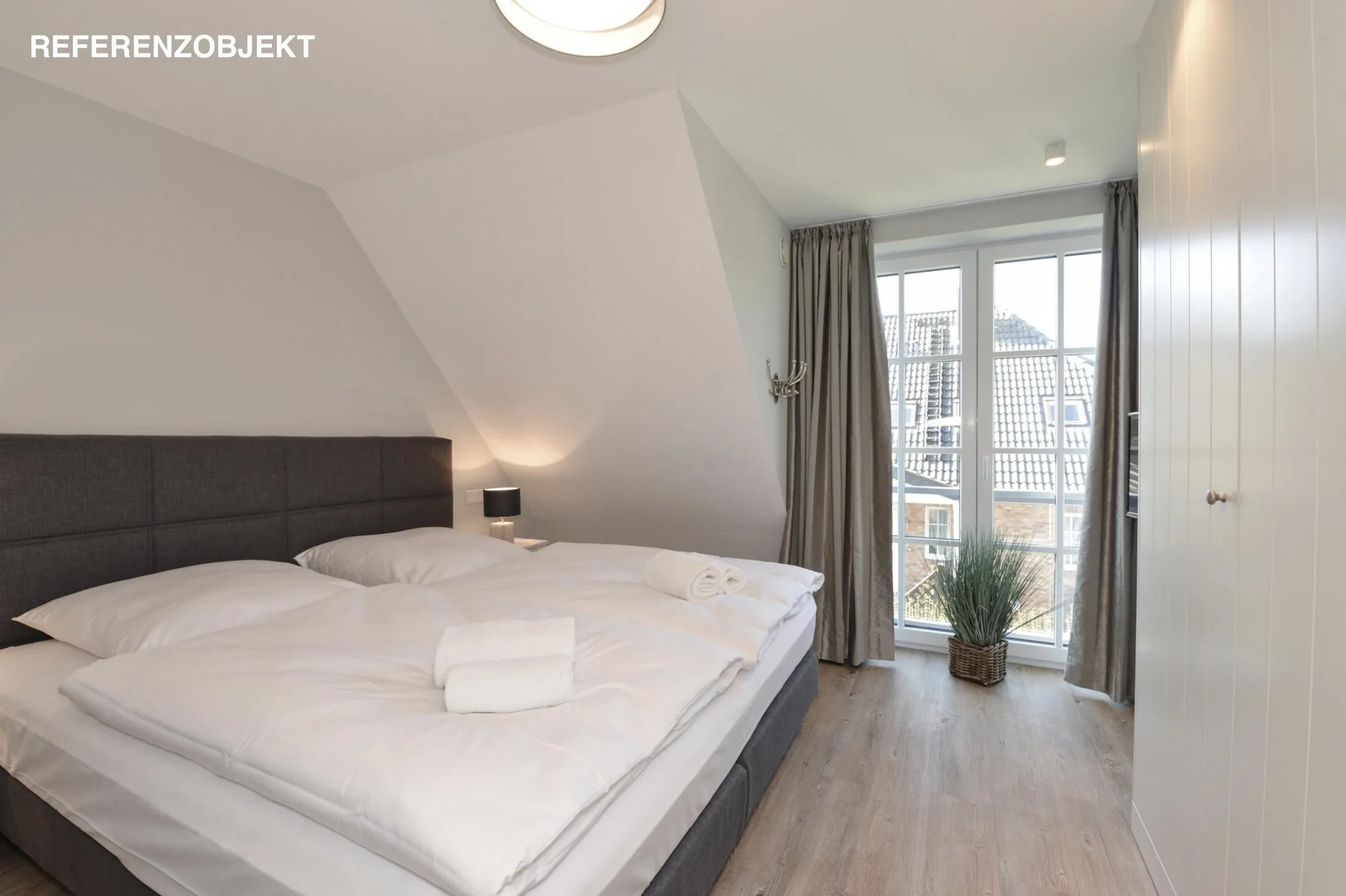 Bild - Schöner Neubau mit einer Dauerwohnung in Strand- und Stadtnaher Lage in Westerland.