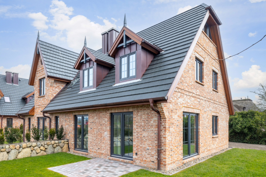 Bild - Neubau von drei exklusiven Doppelhäusern mit 4 Ferien- und 2 Dauerwohnungen