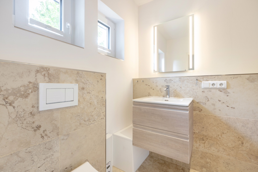 Bild - Hochwertig sanierte Haushälfte auf einem schön eingewachsenen Grundstück von Tinnum