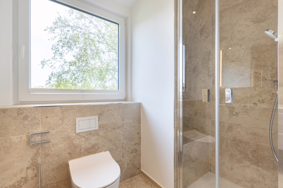 Bild - Hochwertig sanierte Haushälfte auf einem schön eingewachsenen Grundstück von Tinnum