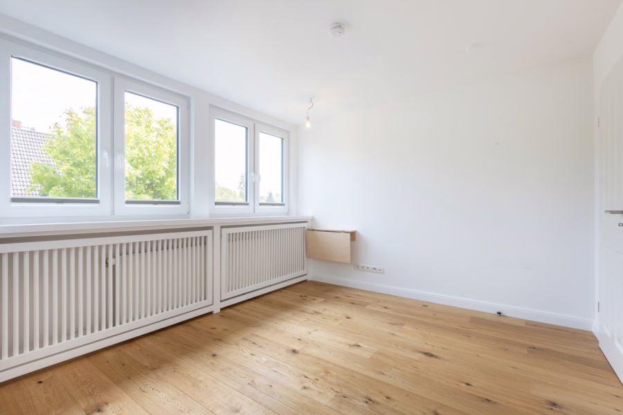 Bild - Hochwertig sanierte Haushälfte auf einem schön eingewachsenen Grundstück von Tinnum