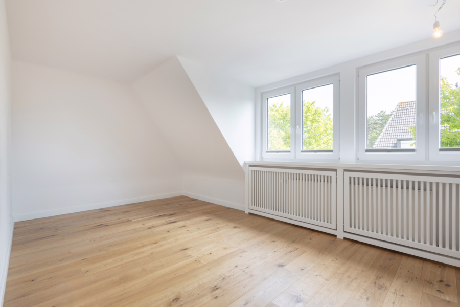 Bild - Hochwertig sanierte Haushälfte auf einem schön eingewachsenen Grundstück von Tinnum