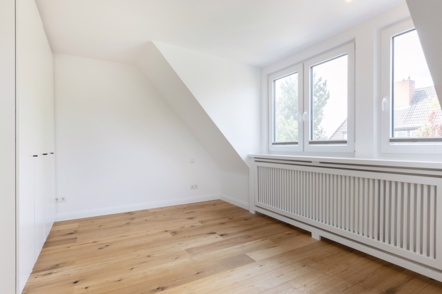 Bild - Hochwertig sanierte Haushälfte auf einem schön eingewachsenen Grundstück von Tinnum