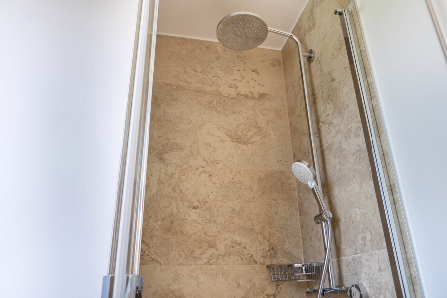 Bild - Hochwertig sanierte Haushälfte auf einem schön eingewachsenen Grundstück von Tinnum