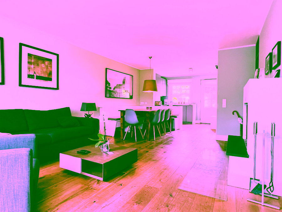 Bild - Saniertes Hausteil unter Reet mit schön angelegtem Gartenteil in Keitum