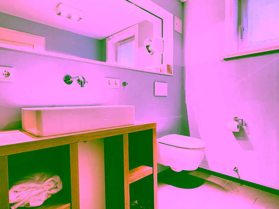 Bild - Saniertes Hausteil unter Reet mit schön angelegtem Gartenteil in Keitum