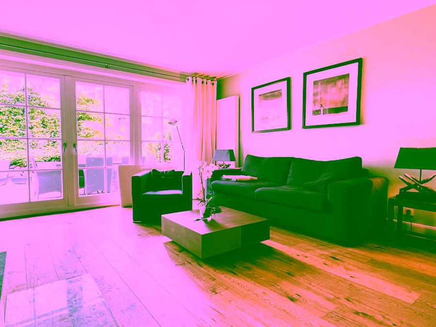 Bild - Saniertes Hausteil unter Reet mit schön angelegtem Gartenteil in Keitum