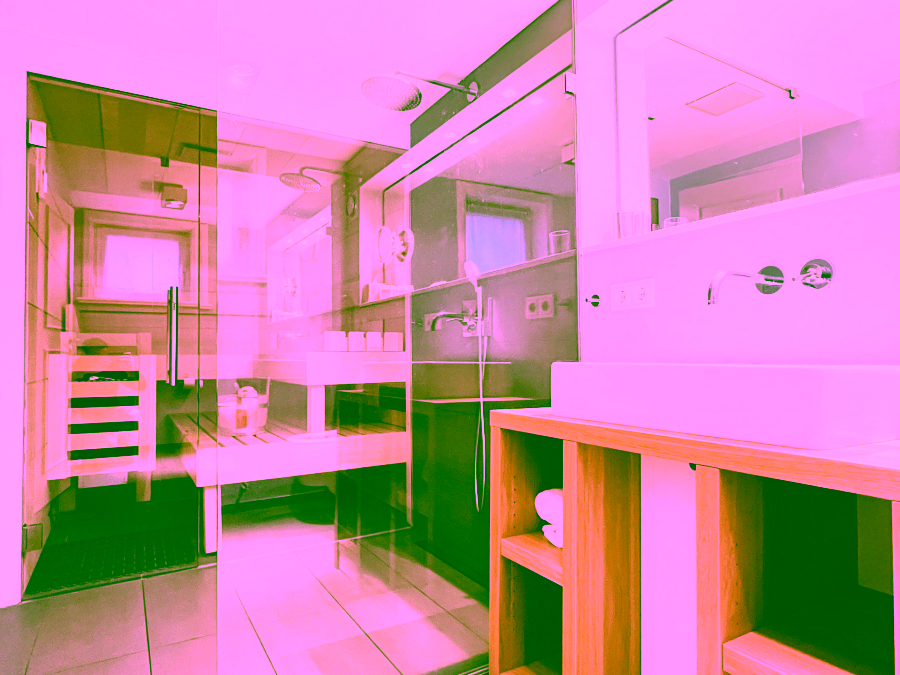 Bild - Saniertes Hausteil unter Reet mit schön angelegtem Gartenteil in Keitum