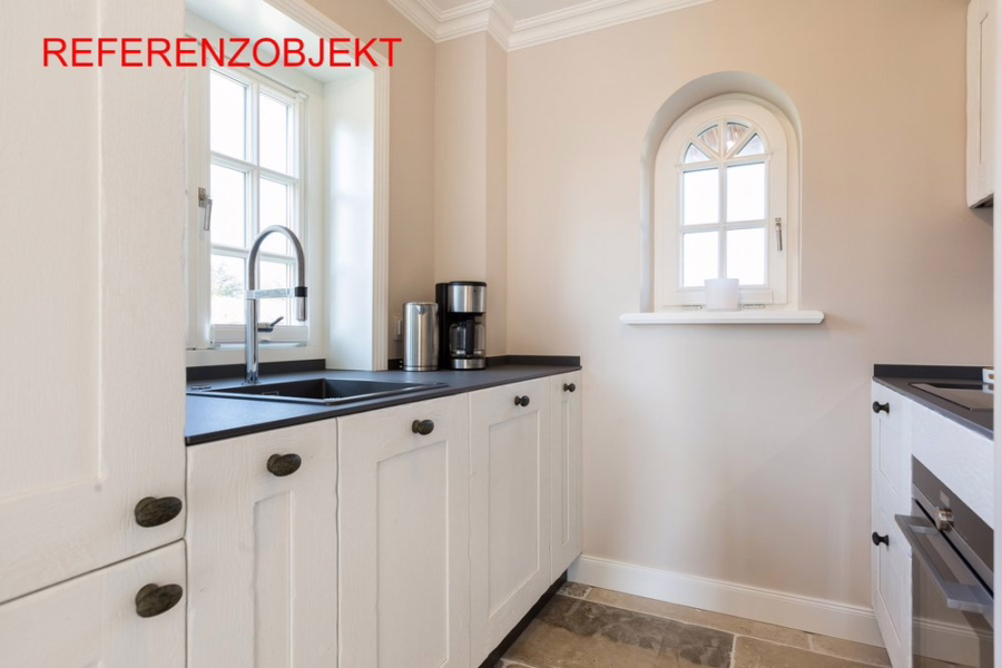 Referenzobjekt - Doppelhaushälften unter Reet in zentraler und wattnaher Lage von List