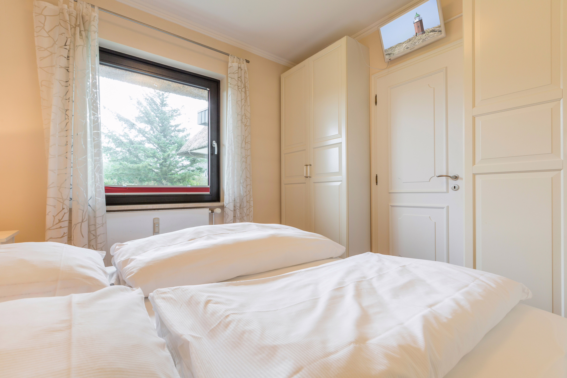 Bild - Schöne Erdgeschoss-Wohnung unter Reet mit Blick auf den Wenningstedter Dorfteich