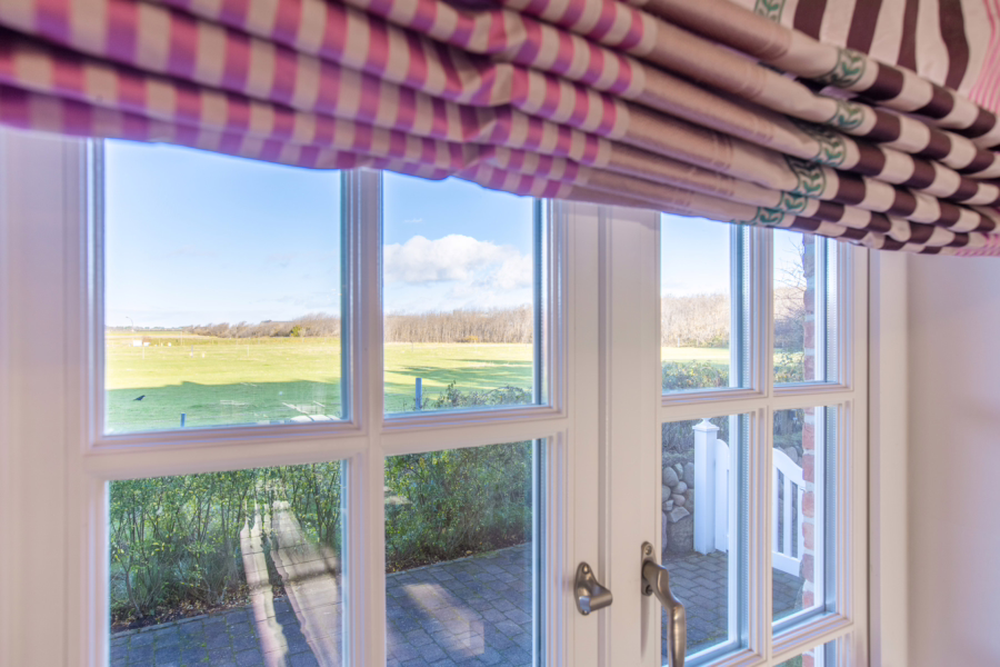 Bild - Moderne Erdgeschosswohnung in Wenningstedter Dorfteichnähe