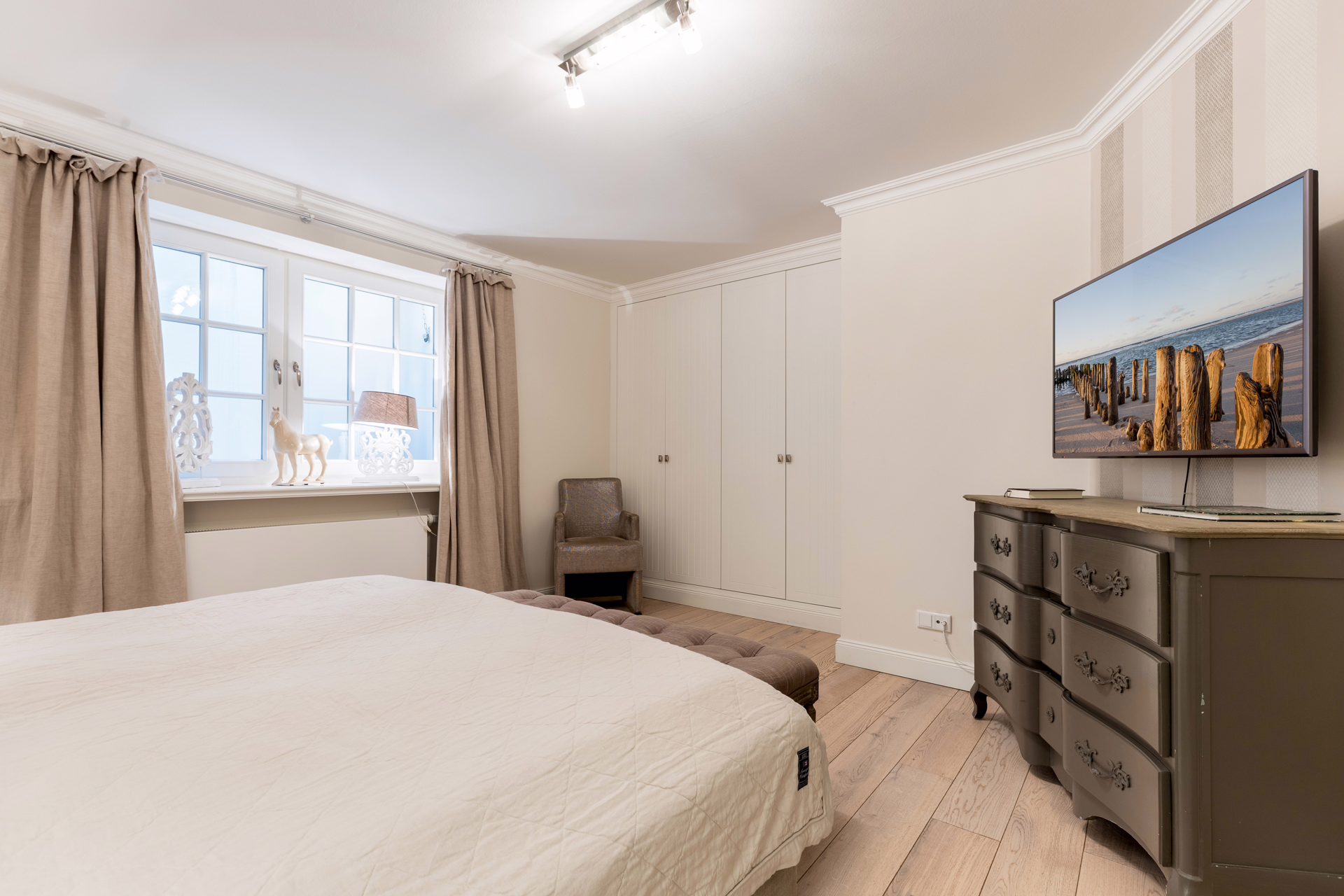 Bild - Moderne Erdgeschosswohnung in Wenningstedter Dorfteichnähe