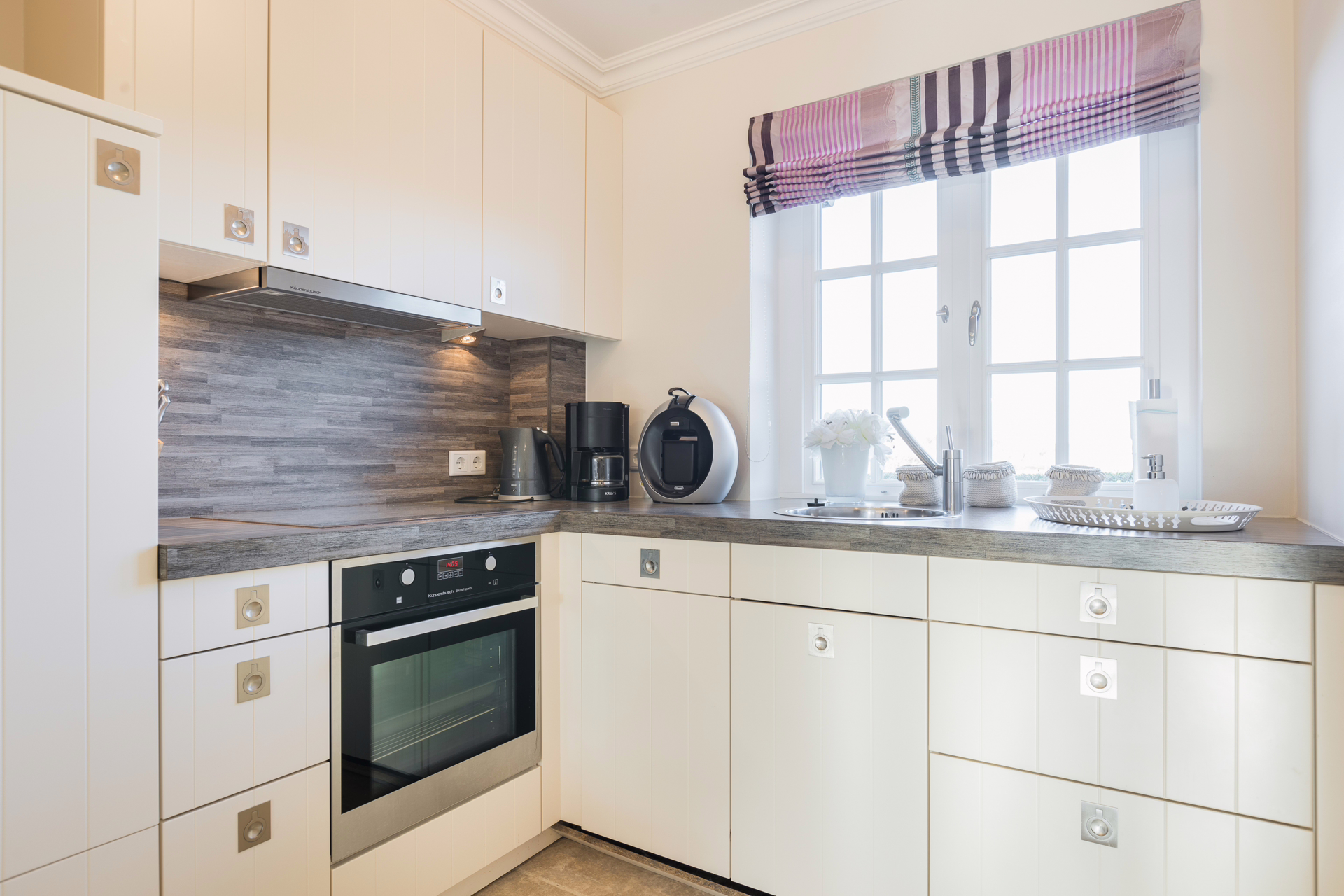Bild - Moderne Erdgeschosswohnung in Wenningstedter Dorfteichnähe