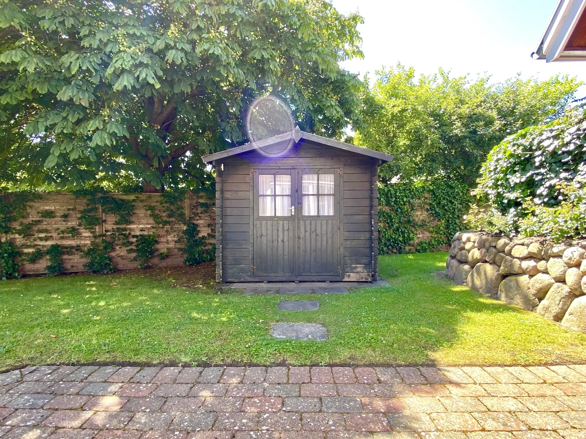 Bild - Erdgeschosswohnung mit Südterrasse und kleinem Gartengrundstück