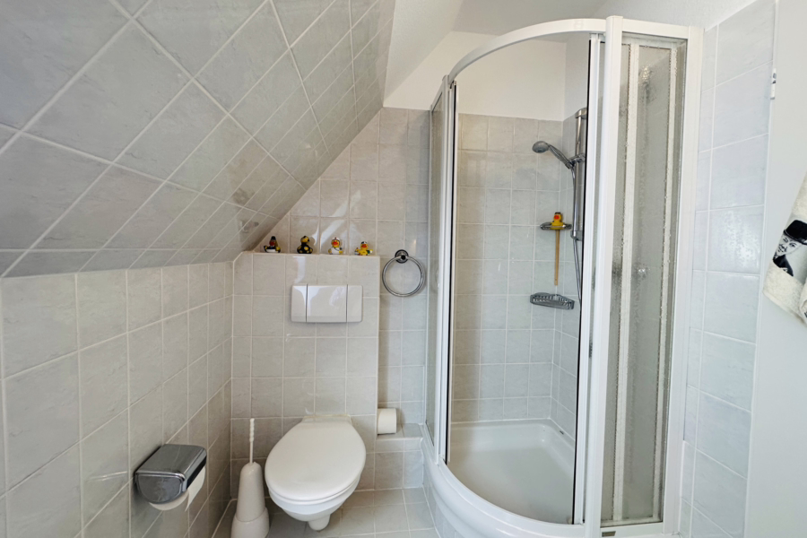 Bild - Haushälfte mit schönem, eingewachsenem Garten im beschaulichen Teil von Morsum