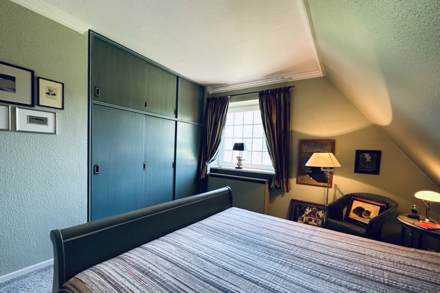 Bild - Haushälfte mit schönem, eingewachsenem Garten im beschaulichen Teil von Morsum