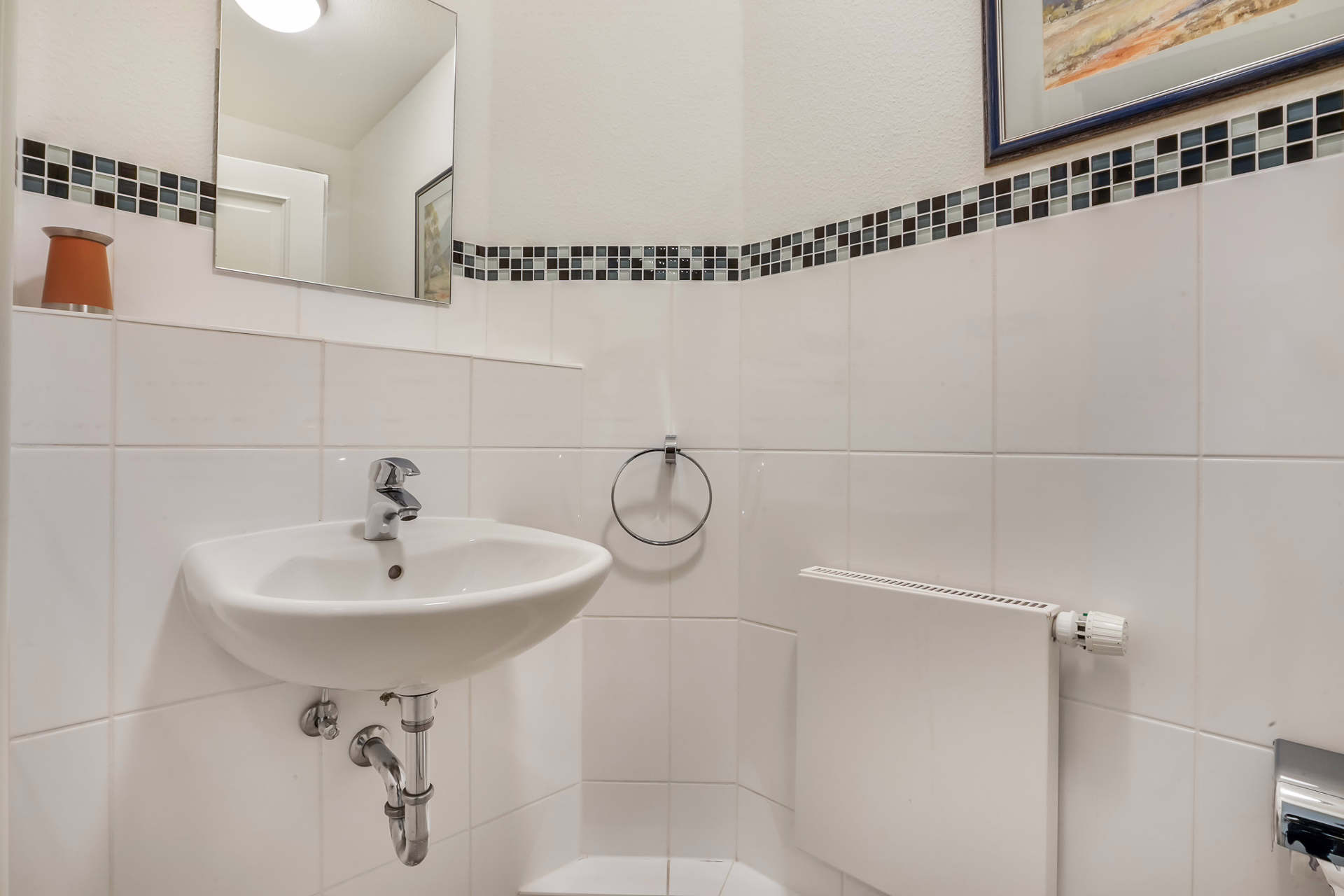 Bild - Zwei Zimmer Wohnung im Herzen von Westerland mit Fahrstuhl, Tiefgarage und Wellnessbereich