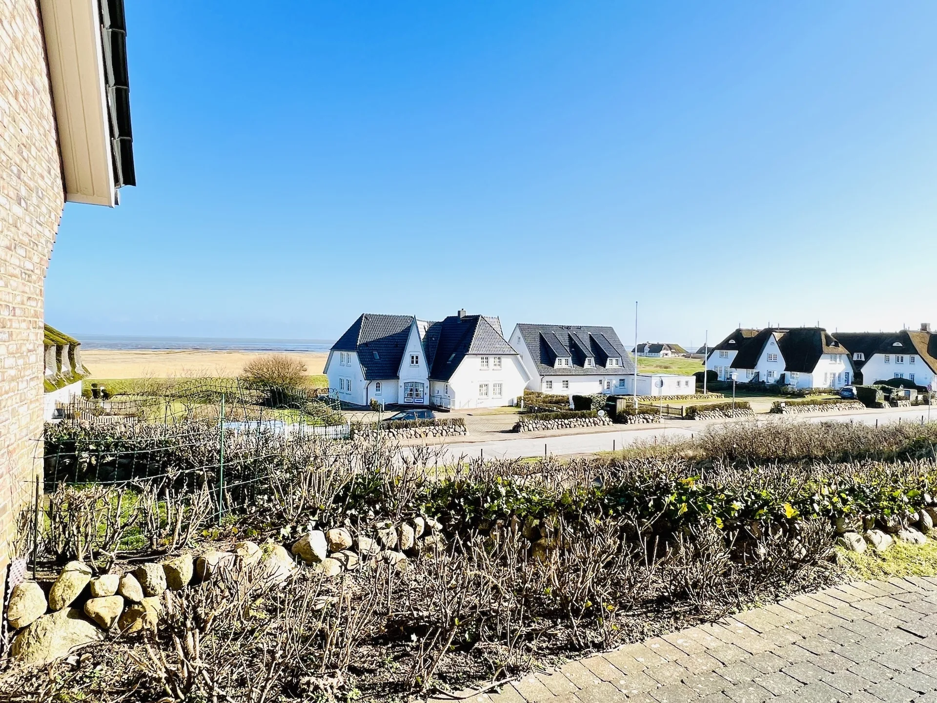 Bild - Erdgeschosswohnung auf einer Düne mit Blick über das Wattenmeer