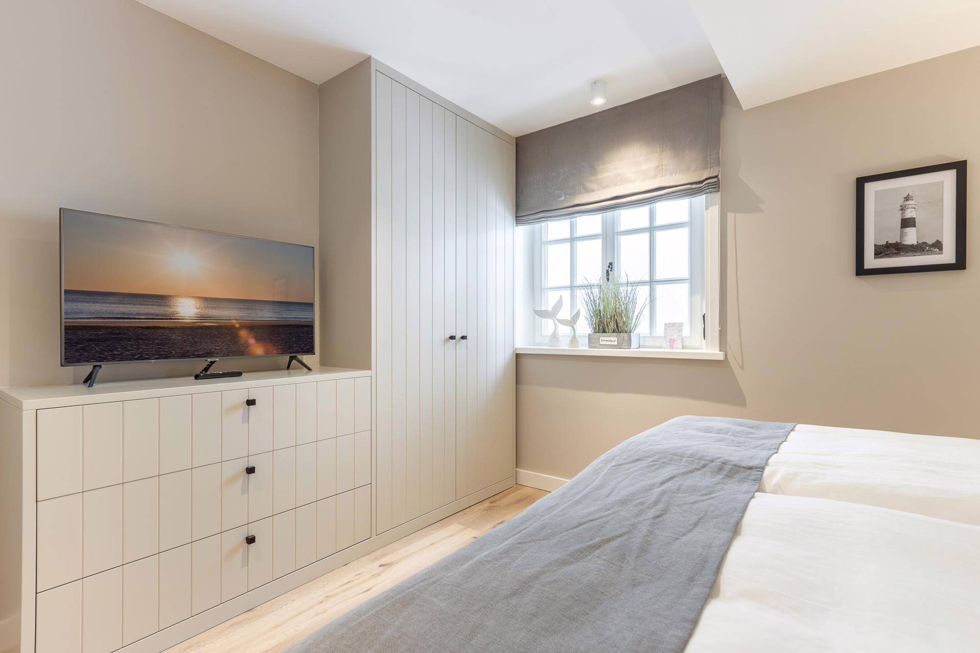 Bild - Neuwertige Doppelhaushälfte unter Reet mit großzügigem Garten in Wenningstedt