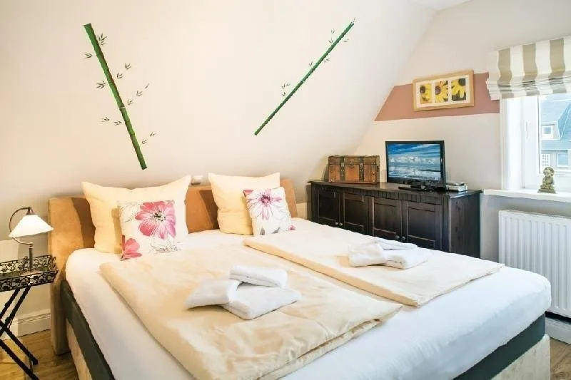 Bild - Doppelhaushälfte mit Dachterrasse und Garage nahe den Lister Dünen