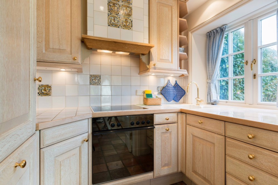 Bild - Schmucke Reethaushälfte mit Erdgarage und Blick in die Kampener Dünen