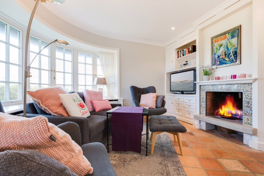 Bild - Schmucke Reethaushälfte mit Erdgarage und Blick in die Kampener Dünen