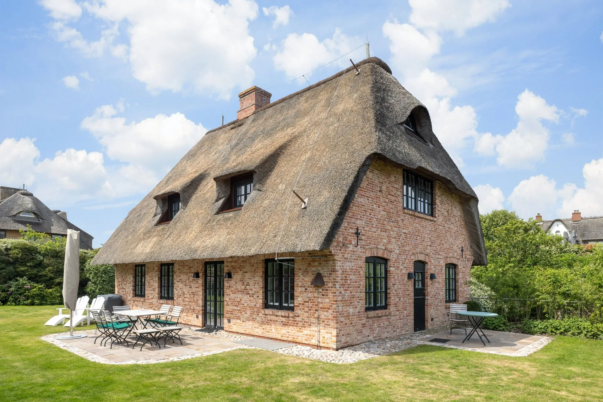 Bild - Charmantes Friesenhaus unter Reet mit einer Erdgarage am Keitumer Wattenmeer