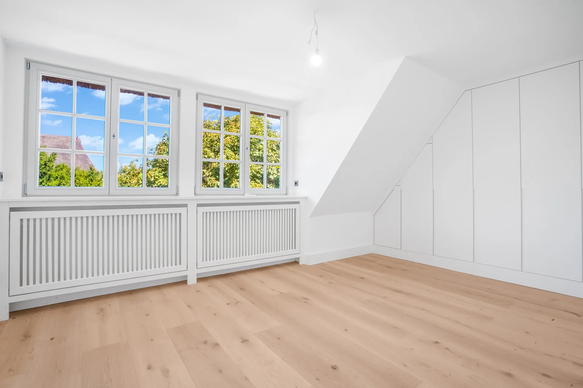 Bild - Liebevoll sanierte Haushälfte unter Reet in Keitum mit einer Garage