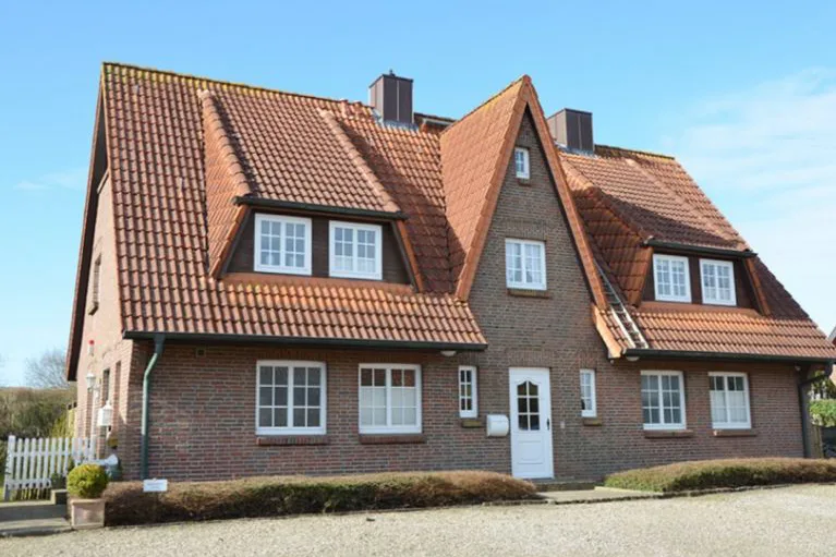 Haus - Helle, moderne 3-Zimmer-Wohnung mit Süd-Westloggia in Munkmarsch