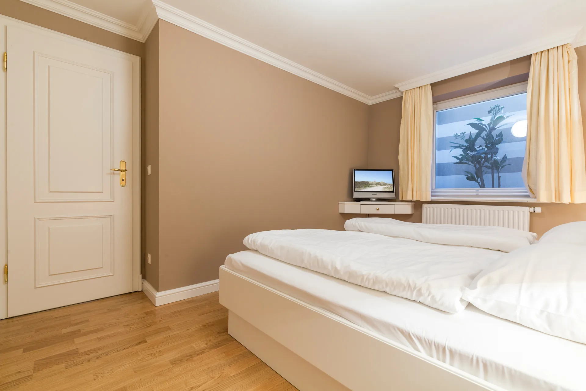 Bild - 3-Zimmer-Erdgeschosswohnung mit Terrasse in zentraler Lage von Wenningstedt