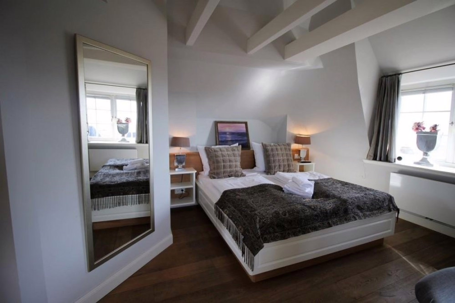 Bild - Einzelhaus auf der Düne mit herrlichem Wattblick