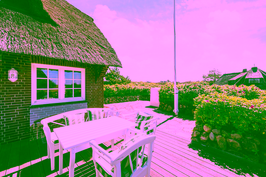 Bild - Reetgedecktes Hausteil zwischen beiden Meeren in Kampen