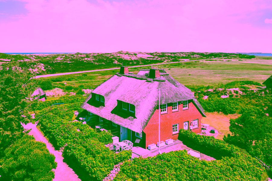 Bild - Reetgedecktes Hausteil zwischen beiden Meeren in Kampen